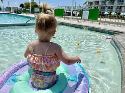 Seasonal outdoor pool, open 9:00 AM to 8:00 PM, sun loungers