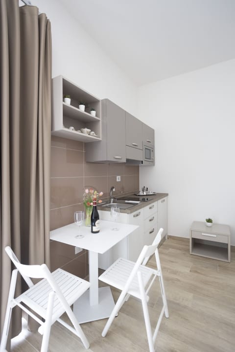 Standard Studio | Private kitchen | Full-size fridge, microwave, stovetop, coffee/tea maker