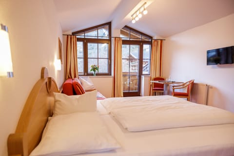 Quadruple Room, Balcony, Mountain View (Haupthaus) | 1 bedroom, premium bedding, in-room safe, desk