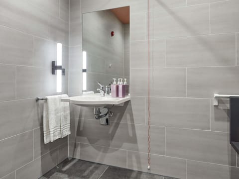 Shower, rainfall showerhead, hair dryer, towels