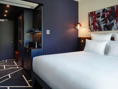 Premium bedding, down comforters, in-room safe, blackout drapes