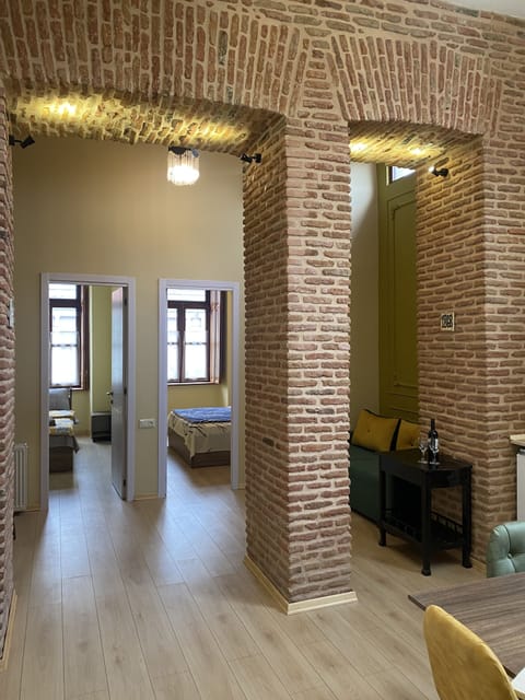Luxury 2-bdr Apartment Historic Building | Living area | 42-cm flat-screen TV with satellite channels, TV