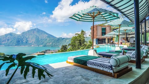 2 outdoor pools, pool umbrellas, sun loungers