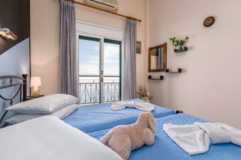 Twin Room, Sea View | Iron/ironing board, free WiFi, bed sheets