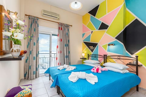 Twin Room, Sea View | Iron/ironing board, free WiFi, bed sheets