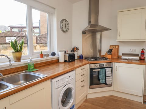 Fridge, electric kettle, toaster, cookware/dishes/utensils