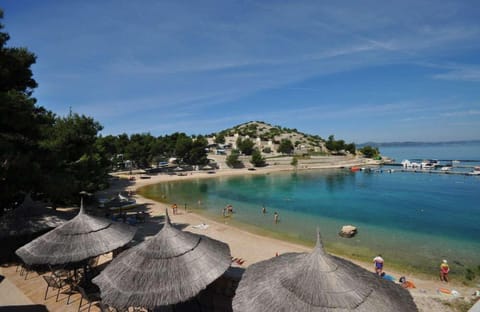 On the beach, beach umbrellas, beach volleyball
