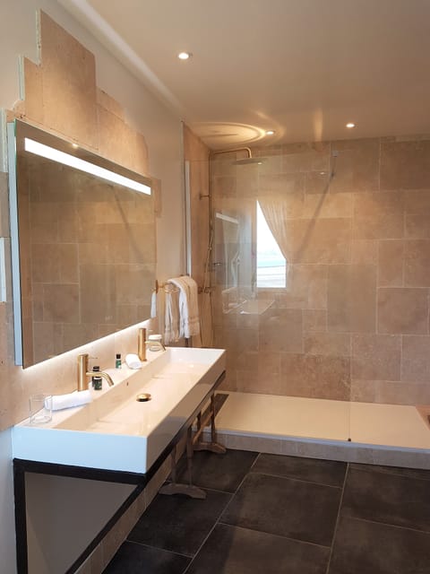 Deluxe Double Room | Pillowtop beds, in-room safe, individually decorated, blackout drapes