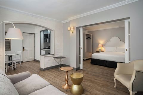 Executive Suite, 1 Bedroom | 1 bedroom, in-room safe, desk, iron/ironing board