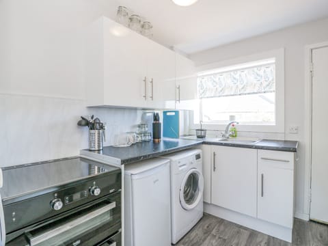 Fridge, electric kettle, toaster, cookware/dishes/utensils