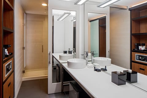 Designer toiletries, hair dryer, towels