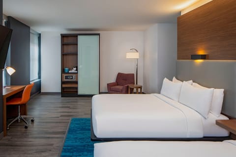 Hypo-allergenic bedding, down comforters, in-room safe, desk