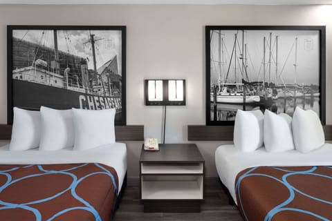 Desk, laptop workspace, bed sheets