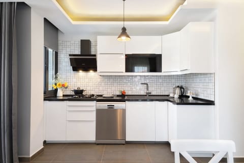 Deluxe Room, 1 Queen Bed with Sofa bed, Garden View | Private kitchen | Electric kettle