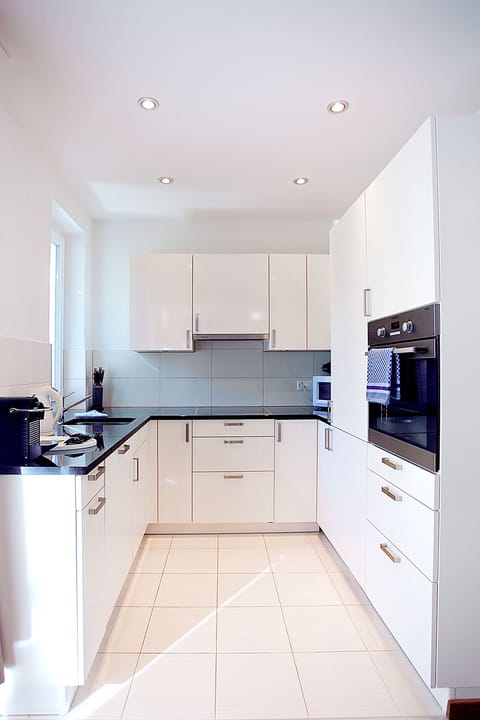 Premium Apartment, 2 Bedrooms | Private kitchen | Full-size fridge, microwave, oven, stovetop