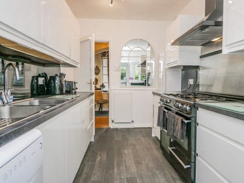 Fridge, electric kettle, toaster, cookware/dishes/utensils