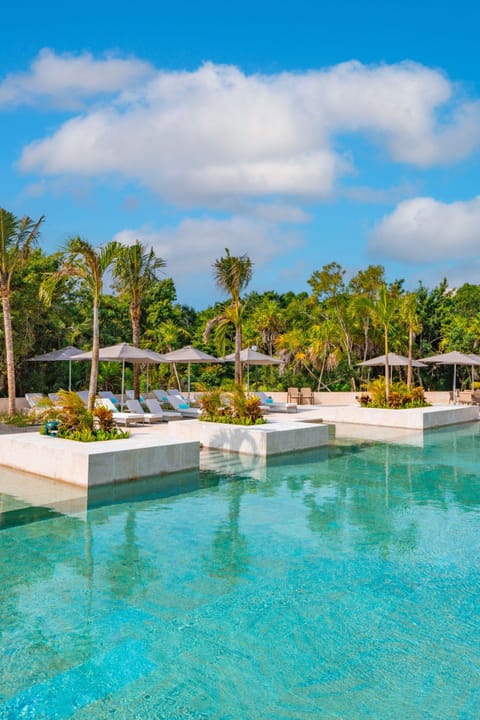 6 outdoor pools, pool umbrellas