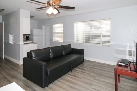 Suite, 2 Queen Beds | Living area | TV