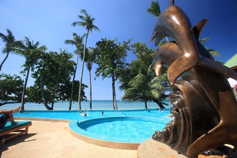Outdoor pool, pool umbrellas, sun loungers