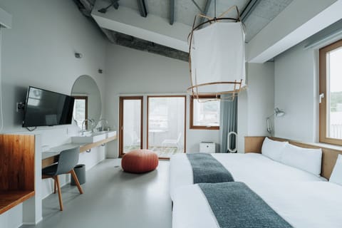 Suite Room, Non Smoking | Down comforters, in-room safe, desk, blackout drapes