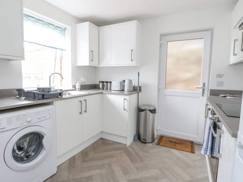 Fridge, electric kettle, toaster, cookware/dishes/utensils