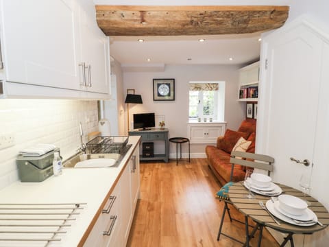 Fridge, electric kettle, cookware/dishes/utensils