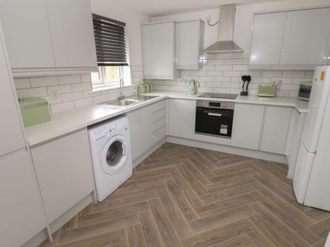 Fridge, electric kettle, toaster, cookware/dishes/utensils