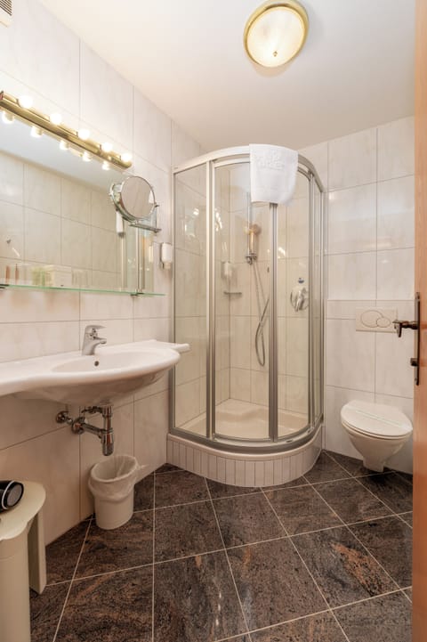 Hair dryer, bathrobes, towels, soap