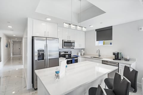 Junior Suite, 2 Bedrooms, Ocean View | Private kitchen | Full-size fridge, microwave, oven, stovetop