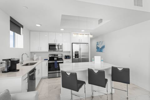Luxury Suite, 2 Bedrooms, Ocean View | Private kitchen | Full-size fridge, microwave, oven, stovetop