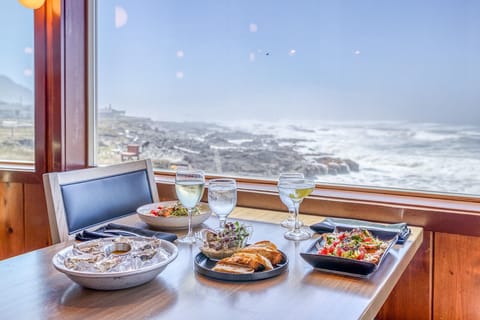 Lunch, dinner, brunch served; beach views