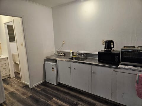 Family Room, Non Smoking, Kitchen (Family unit) | Private kitchen | Full-size fridge, coffee/tea maker