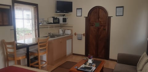 Studio, Kitchenette (The Cellar) | Living area | Flat-screen TV, DVD player