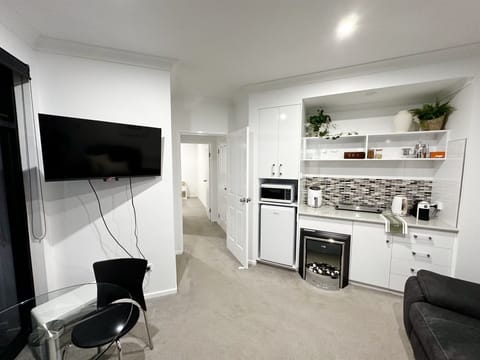 Standard Apartment, 1 King Bed, Non Smoking, Balcony (apartment) | Living area | 50-inch Smart TV with digital channels