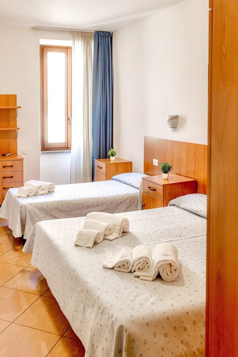 Triple Room | Down comforters, desk, laptop workspace, free WiFi