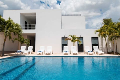 Outdoor pool, open 8:00 AM to 10:00 PM, free cabanas