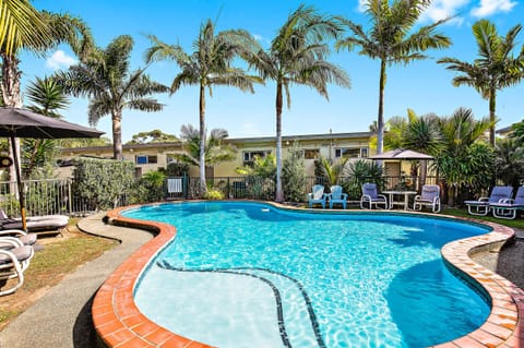 Outdoor pool, open 9:00 AM to 5:00 PM, pool umbrellas, sun loungers