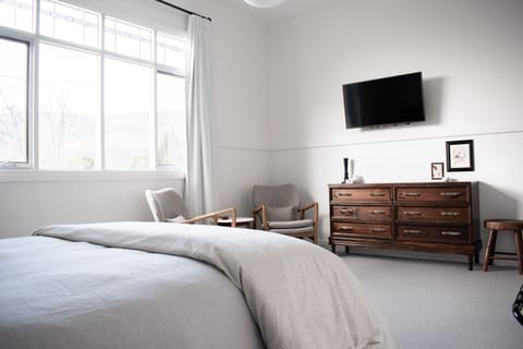 Hill View Suite | Premium bedding, blackout drapes, iron/ironing board, free WiFi