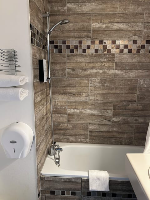 Superior Double Room | Bathroom | Combined shower/tub, hair dryer, towels, soap