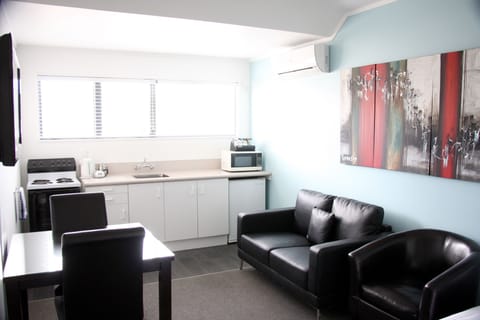 One Bedroom Spa Apartment | Living room | 42-inch plasma TV with digital channels, TV