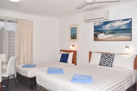Standard Triple Room (Queen and Single Bed) | Desk, laptop workspace, iron/ironing board, WiFi (free)