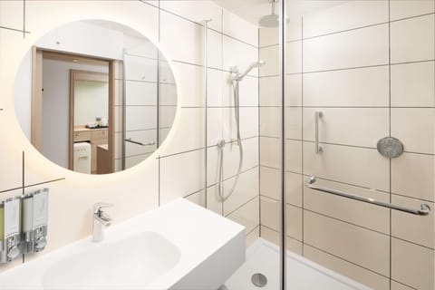 Shower, rainfall showerhead, eco-friendly toiletries, hair dryer