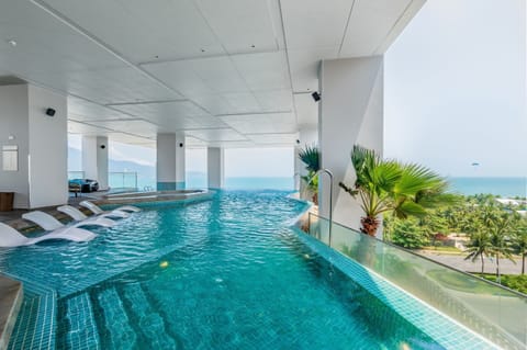 Indoor pool, open 6:00 AM to 8:00 PM, pool umbrellas, sun loungers