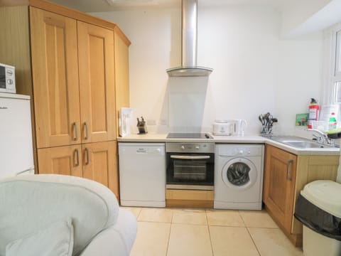 Fridge, electric kettle, toaster, cookware/dishes/utensils