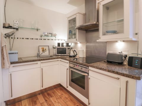 Fridge, electric kettle, toaster, cookware/dishes/utensils