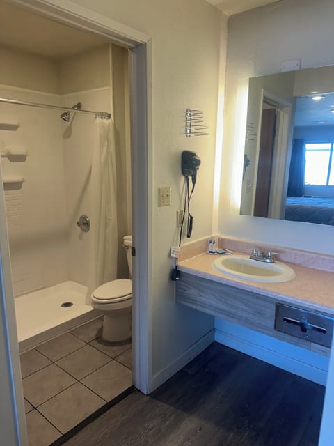 Basic Single Room, 1 Bedroom, Non Smoking | Bathroom | Shower, rainfall showerhead, towels, soap