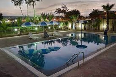 Outdoor pool, pool umbrellas, sun loungers