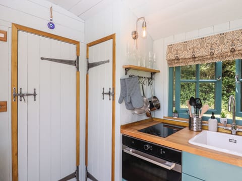 Fridge, electric kettle, toaster, cookware/dishes/utensils