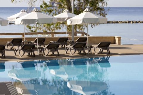 Seasonal outdoor pool, pool umbrellas, sun loungers