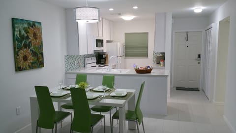 Standard Suite, 1 King Bed | Private kitchen | Full-size fridge, microwave, stovetop, dishwasher